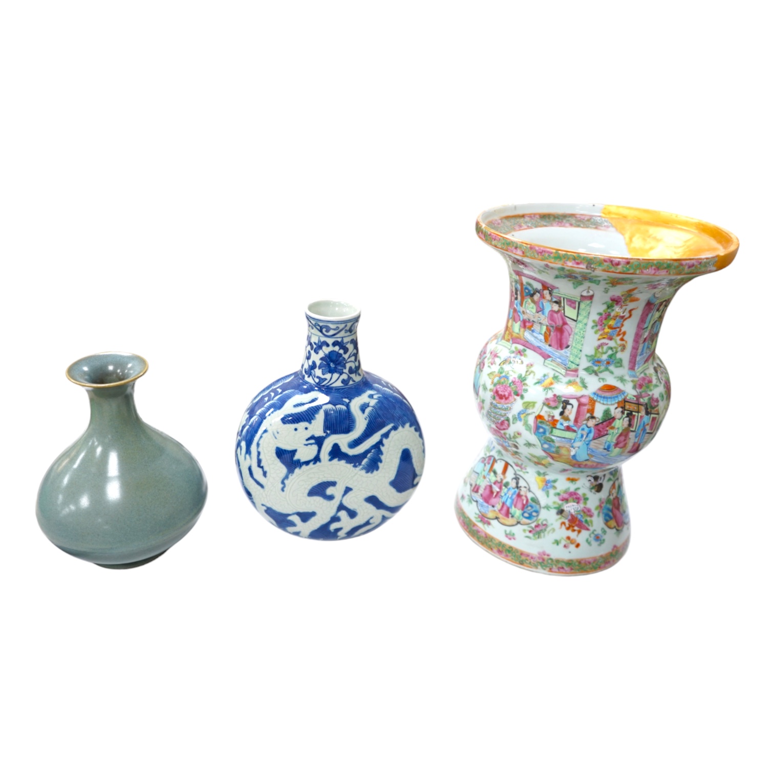 A large 19th century Chinese famille rose vase, a green glazed pear-shaped vase, and a blue and white dragon flask (3). Condition - poor to fair.